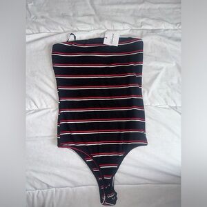 Top(black/red/white details) brand new never worn. M size, strapless top,
